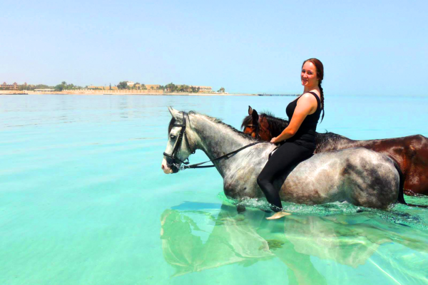 girl2horsesswimming-1600x900